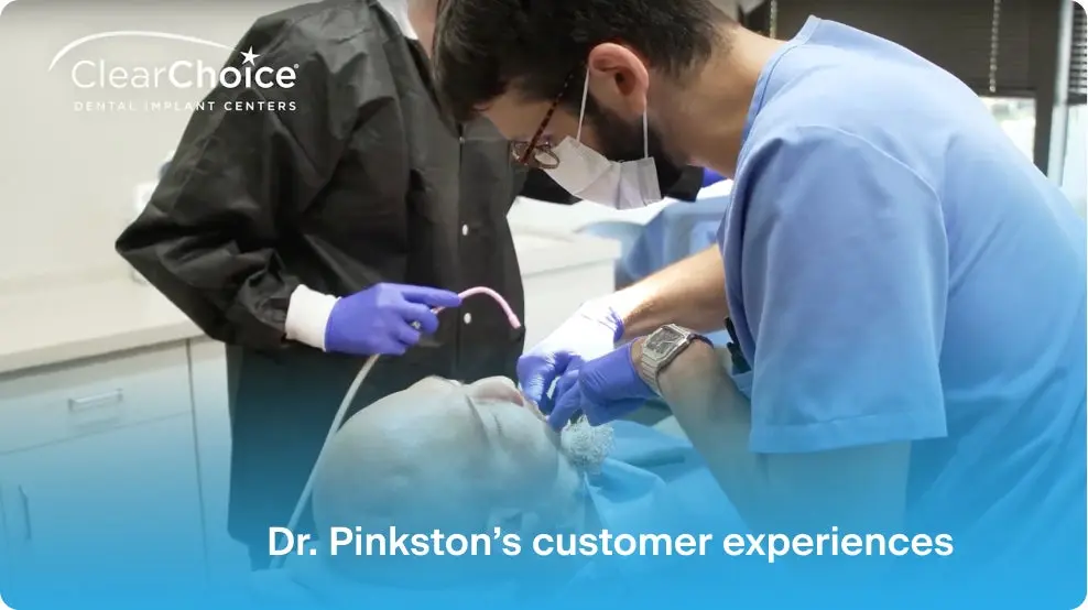 Dr. Pinkston greeting a ClearChoice patient after his dental implant process.