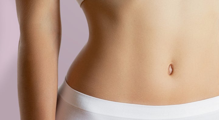 Closeup of a bare mid-section after a coolsculpting treatment at Chapter Aesthetic Studio.