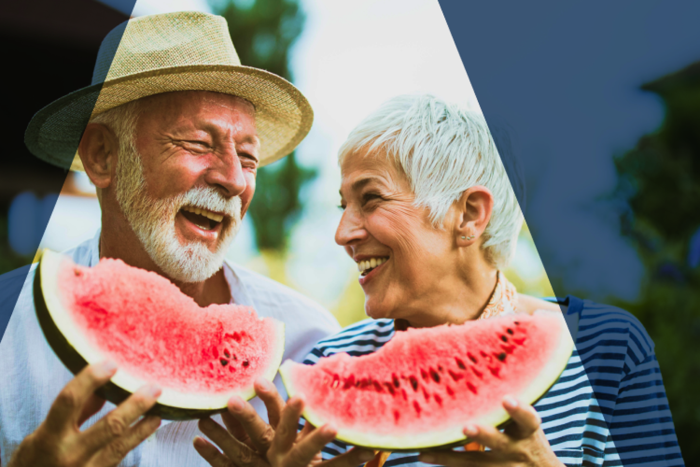 Elderly couple, beaming while looking at each other, their healthy teeth and reflecting excellent oral hygiene. Oral health successfully keep mouth and oral issues like bad breath, mouth sores and spots, and TMJ at bay.
