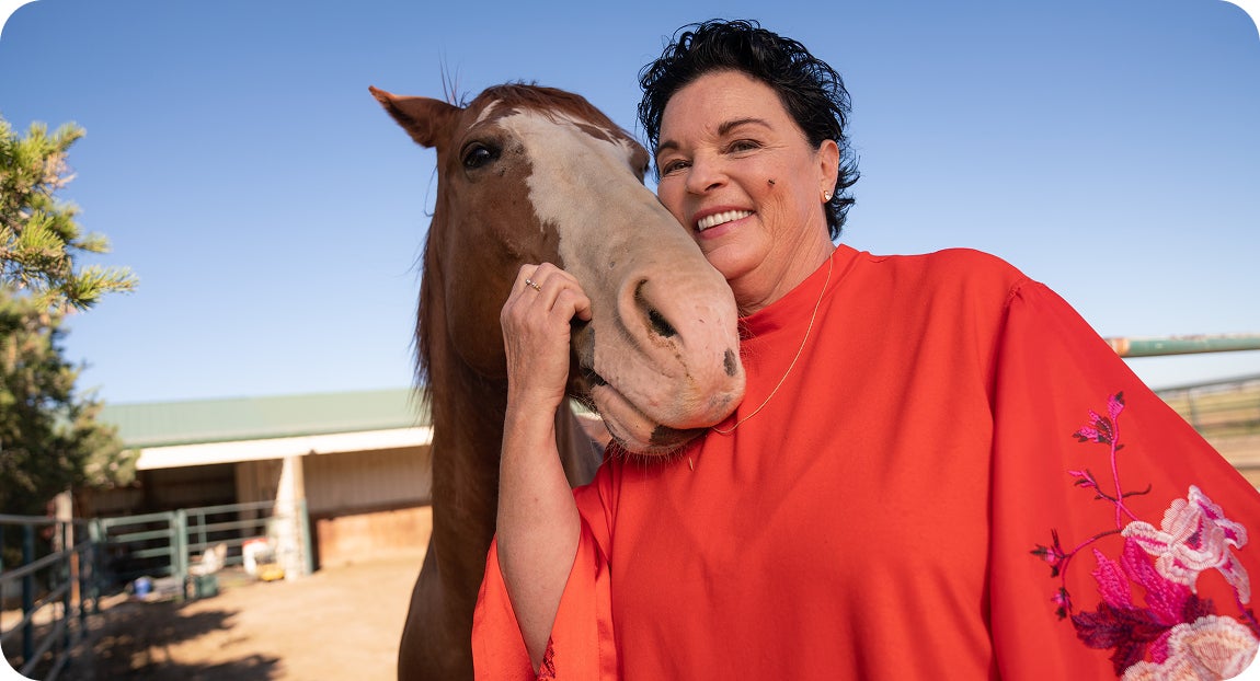 A female patient enjoying her favorite outdoor activities again after receiving her new dental implants from ClearChoice and following post-care healing instructions.