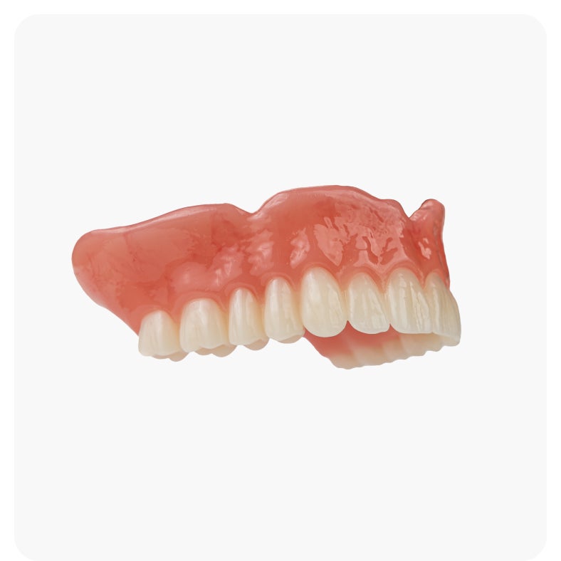 Side view of Aspen Dental signature dentures showing natural tooth shape and gum contours.