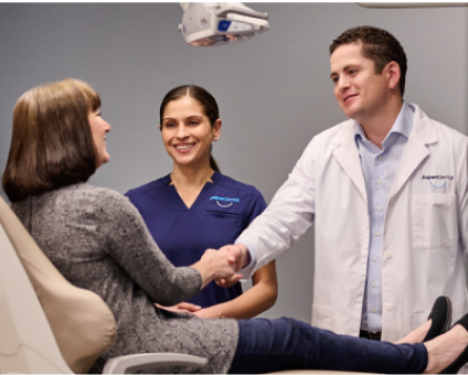 Aspen Dental doctor and patient shaking hands