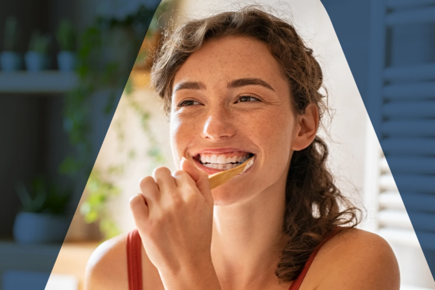 A woman brushing teeth to prevent common dental issues such as cavities, gum redness, plaque buildup, and misaligned teeth, highlighting the importance of oral hygiene and regular dental check-ups.