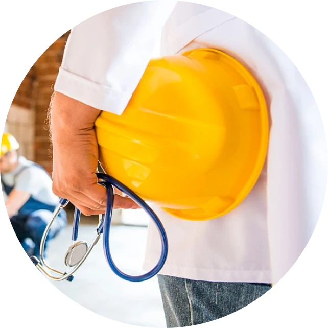 A doctor holds a hard hat and a stethoscope. 