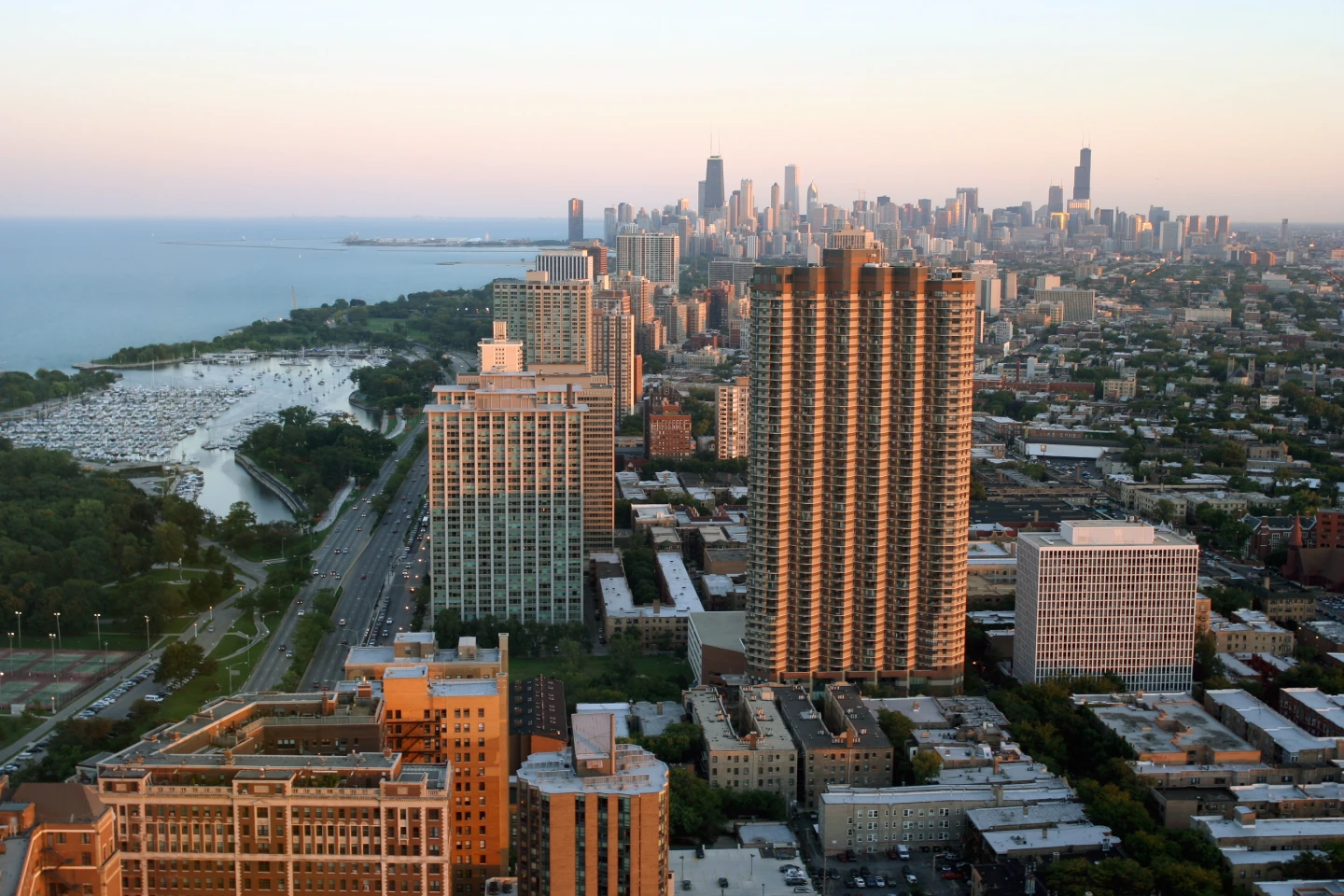 Chicago city skyline and lakefront at twilight.