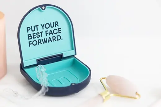 Motto Clear Aligners case with the lid open and showing text that says, "Put your best face forward".