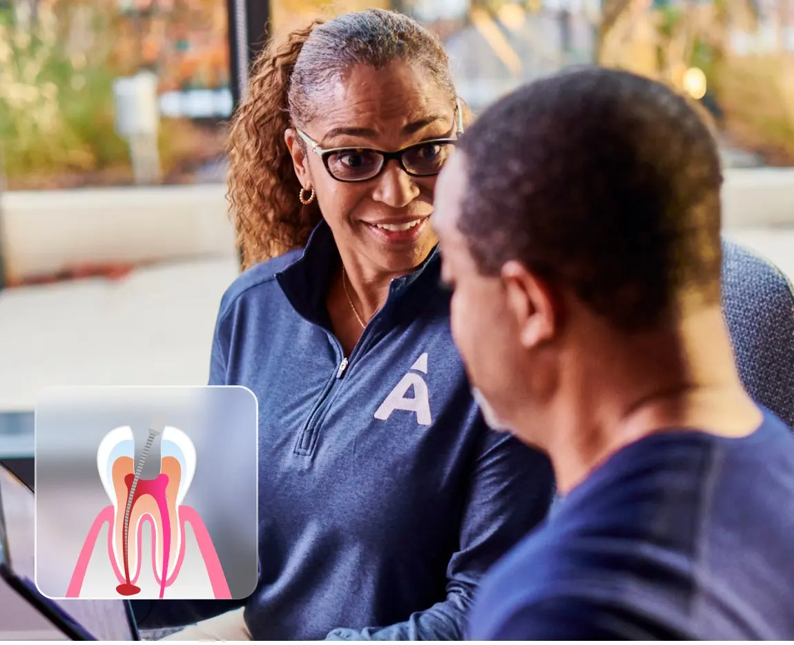 A woman wearing glasses and a shirt with an 'A' logo converses with a man. An inset image of a dental procedure, showing a root canal, is overlaid in the bottom left corner.