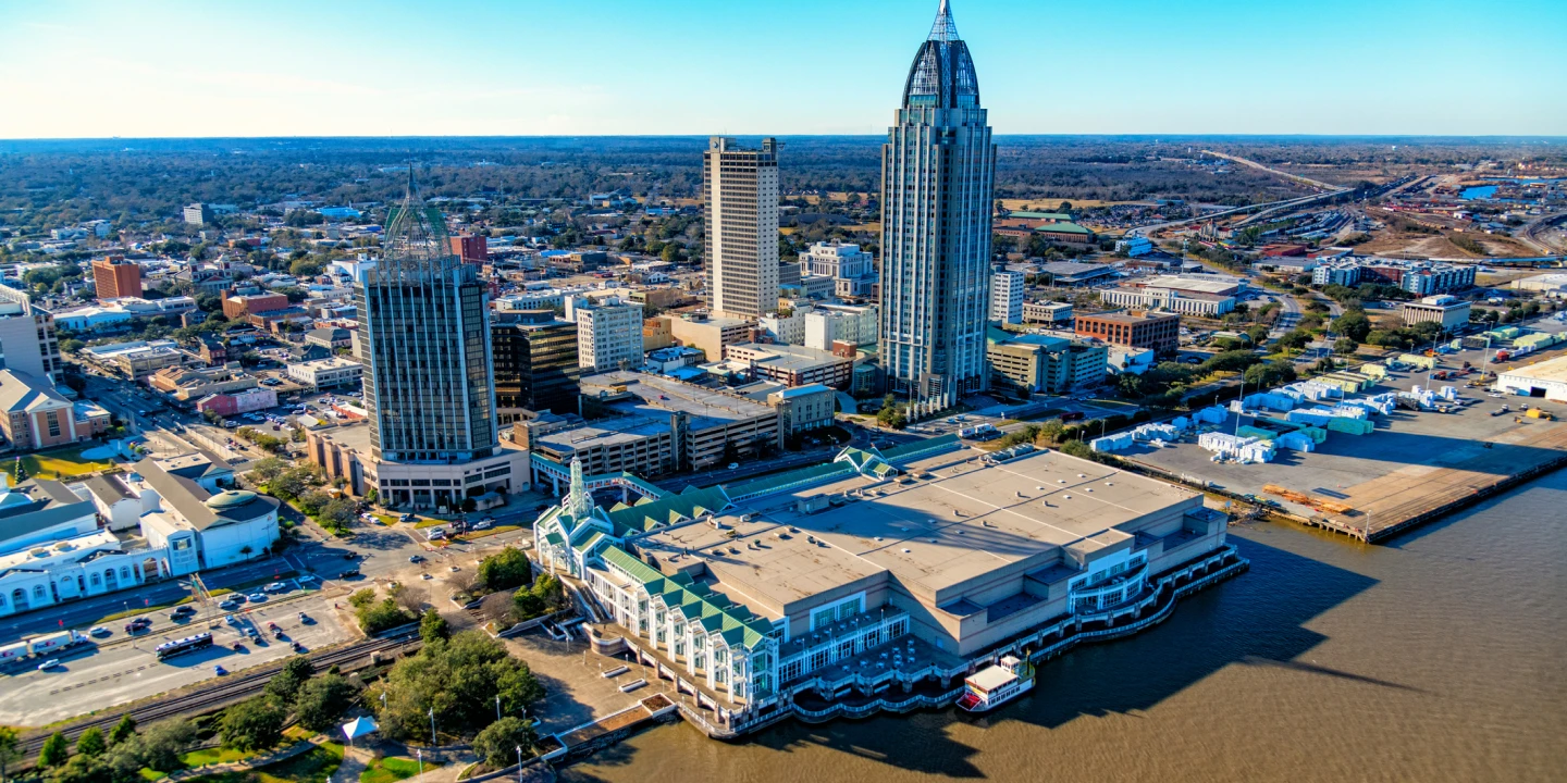 An Aerial view of downtown Mobile from the air at midday. 