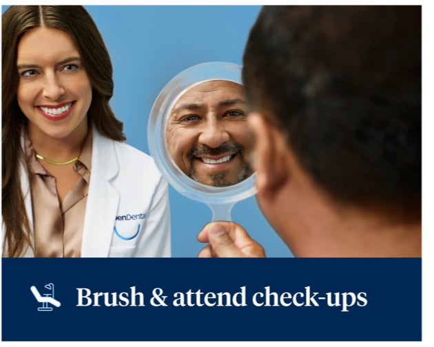 A dentist smiles beside a patient holding a mirror, reflecting his own smile. The text reads, "Brush & attend check-ups" with an icon of a dentist chair.