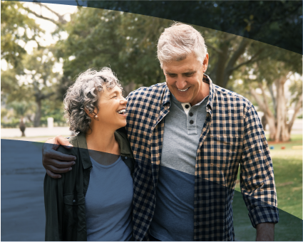 An Aspen Dental couple walks arm-in-arm
