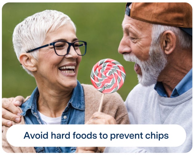 Two smiling elderly people, one holding a large lollipop. The text below reads, "Avoid hard foods to prevent chips.