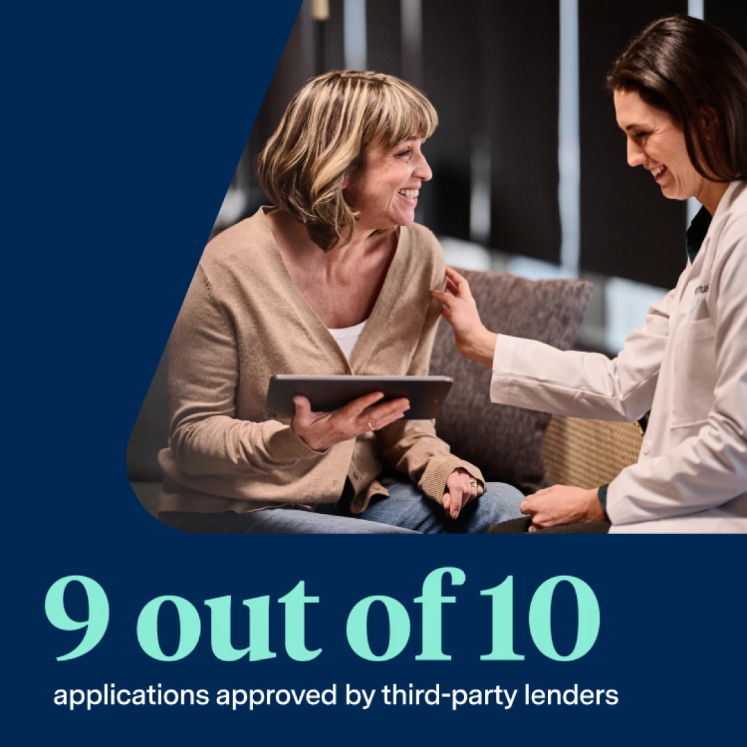 A patient smiling while consulting with an Aspen Dental dentist with the words '9 out of 10 applications approved by third-party lenders.