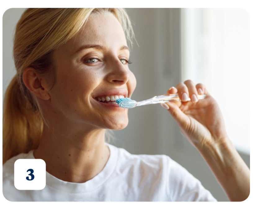 A person wearing a white shirt smiles while holding a toothbrush with blue toothpaste, preparing to brush their teeth. The number "3" is displayed in the bottom left corner indicating the third treatment option for abscessed tooth.