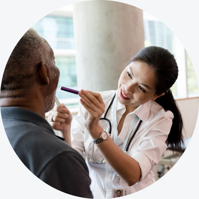 A WellNow doctor examines a patient. 