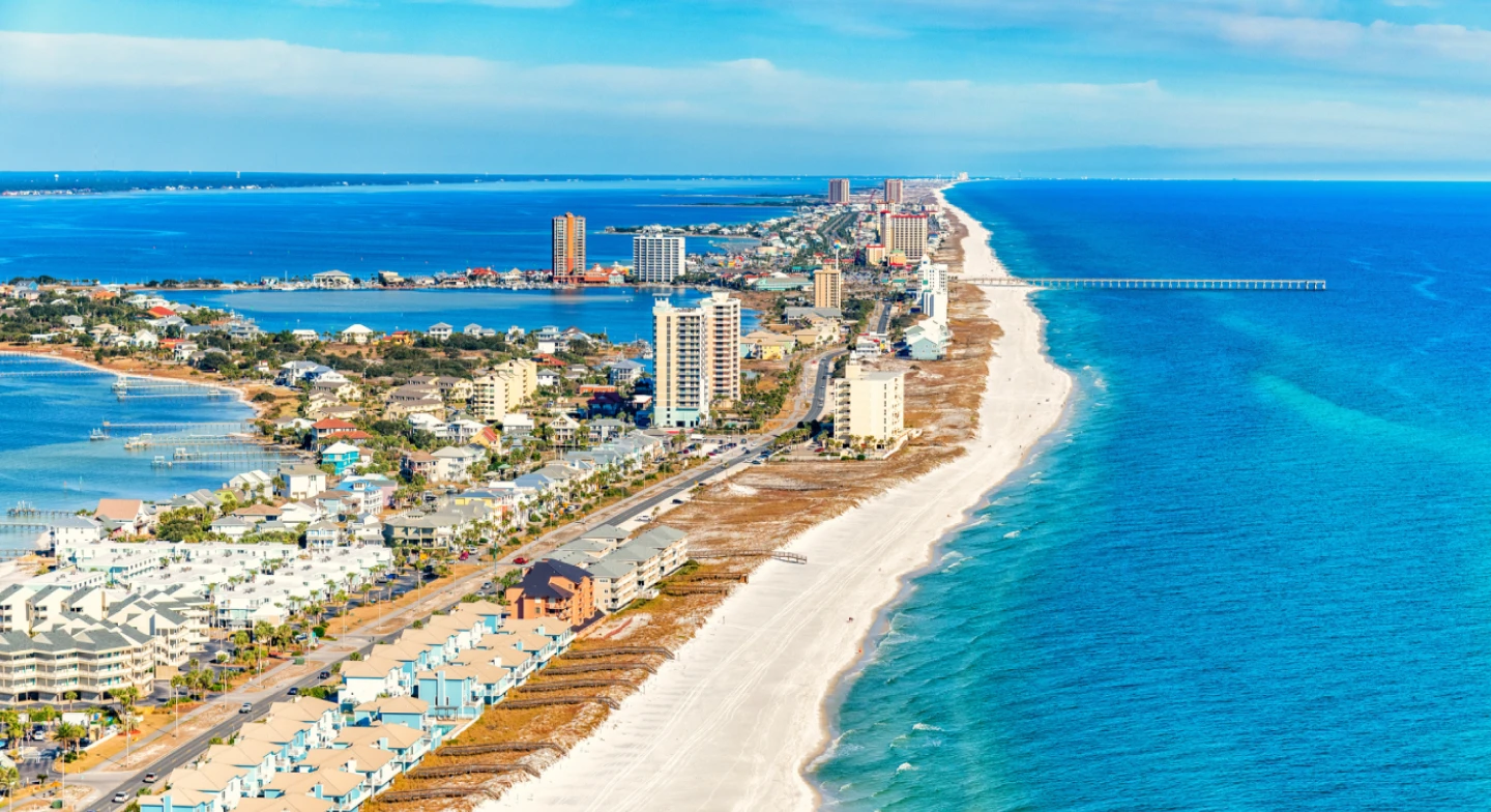 Aerial view of buildings along the beach in Pensacola
