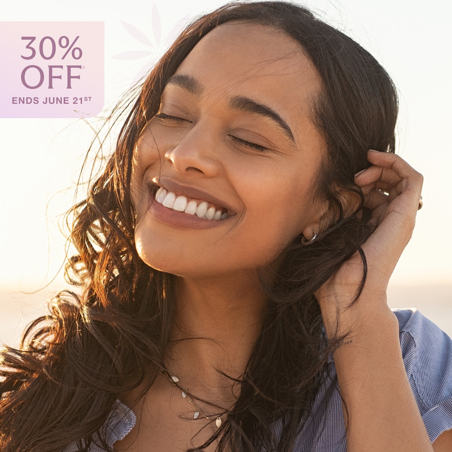 Smiling woman tucking her hair behind her ear promoting Chapter’s filler treatments. Text on image reads “30% off.”