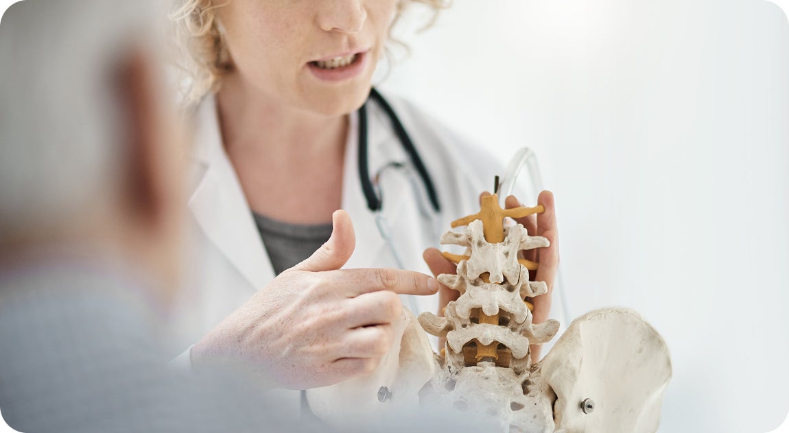 A ClearChoice doctor walking her patient through jaw surgery details, including treatment steps and potential risks.