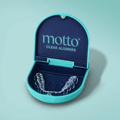 A blue box with motto clear aligners on it
