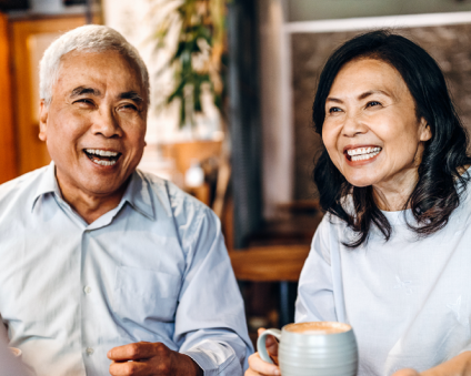 Aspen Dental dentures couple smiling.