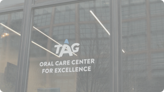 The TAG Oral Care Center logo. 