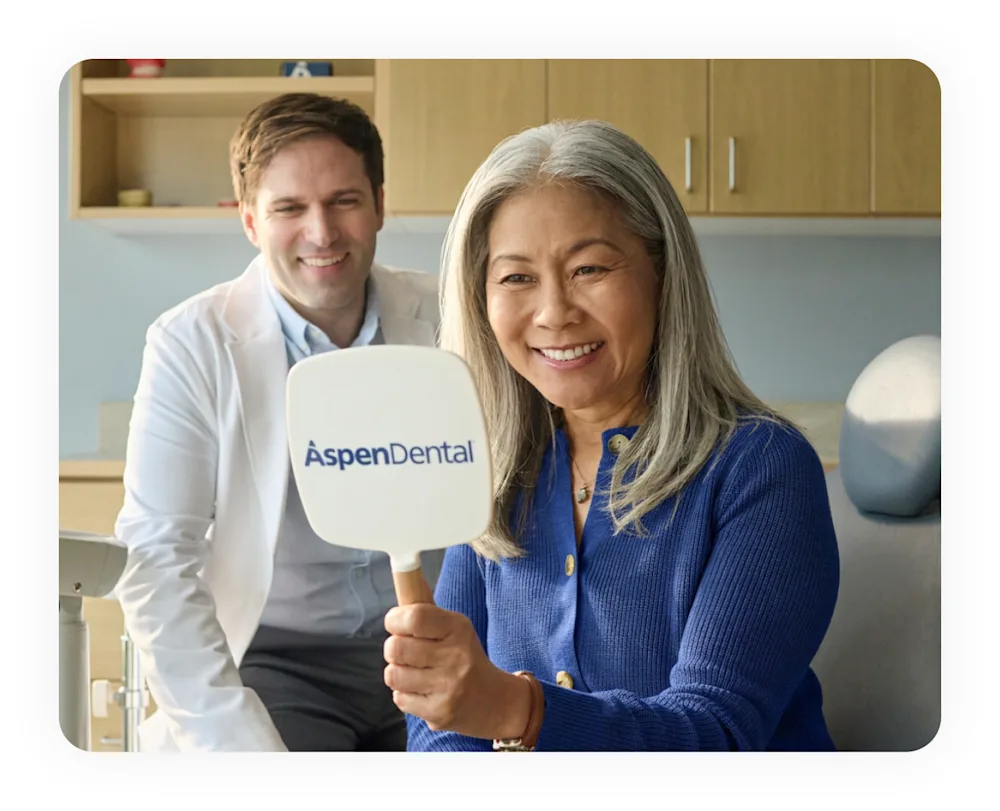 Aspen Dental care team member with a patient
