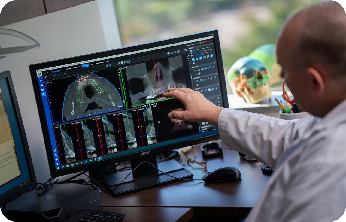 A prosthodontist analyzes a 3D dental scan showing bone loss and implant positioning, emphasizing the clinical impact of delaying tooth replacement. The digital imaging highlights treatment planning precision.