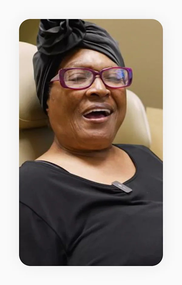 Patient video still - dentures patient in Dallas, TX