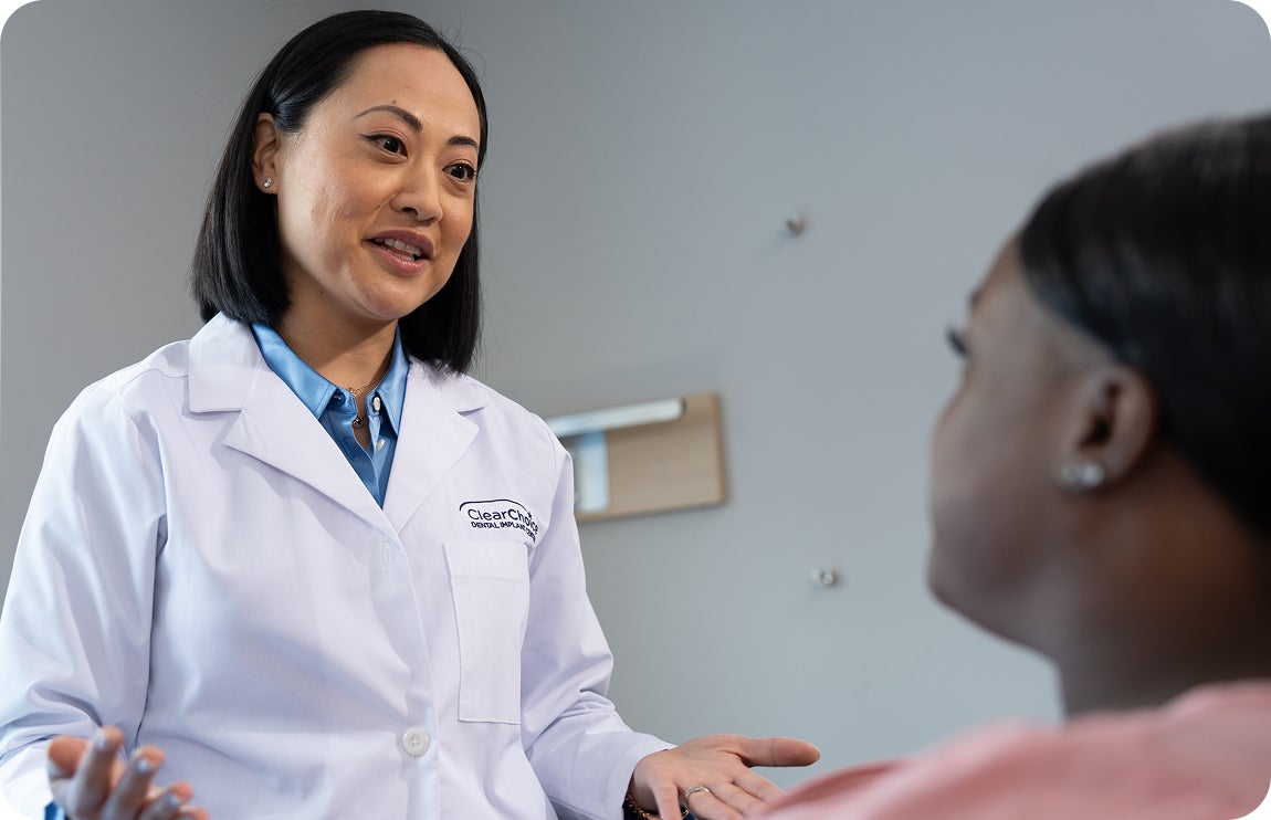 A ClearChoice doctor addressing a patient's concerns around an infected implant and informing her of next steps.