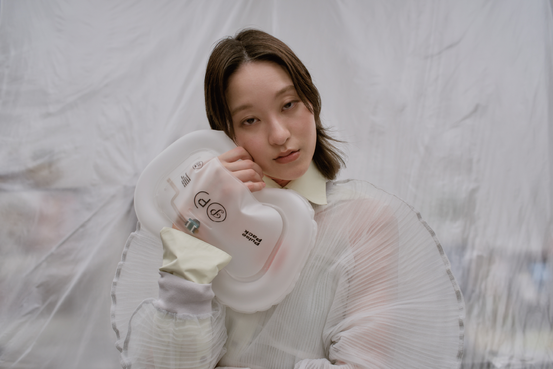 自身の心拍に触れるウェアラブルバッグ