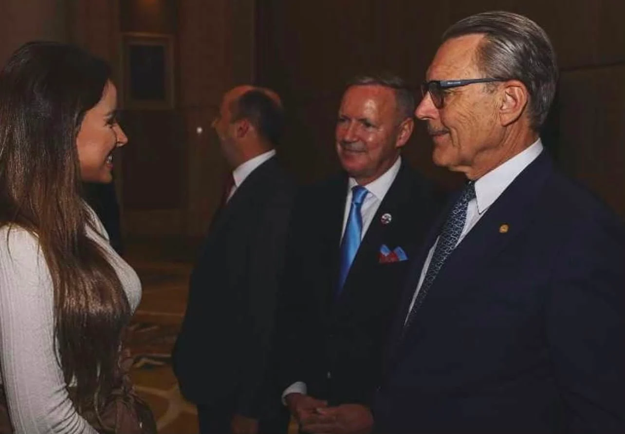 Hasnae Taleb in conversation at an evening reception