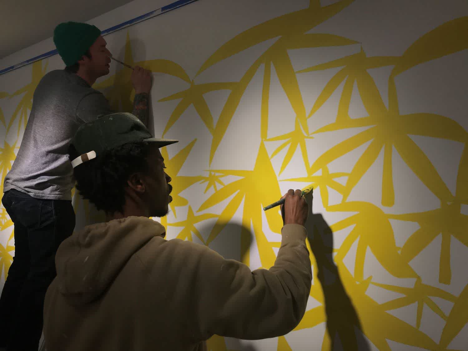 Artist Hampton Boyer painting the star motif for his exhibition There's No Place Like Here at the Virginia Museum of Contemporary Art.