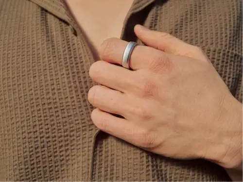Oura Ring with tan shirt