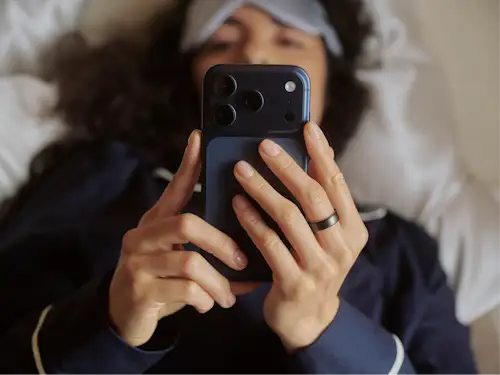 Oura Ring & Woman with Phone