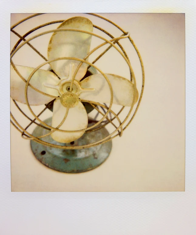 Polaroid of a vintage electric fan. AW064 