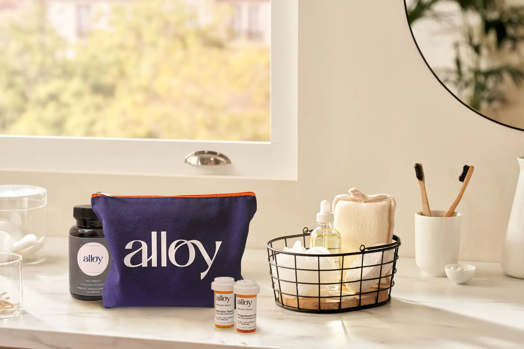 Alloy Pouch and products on bathroom counter.