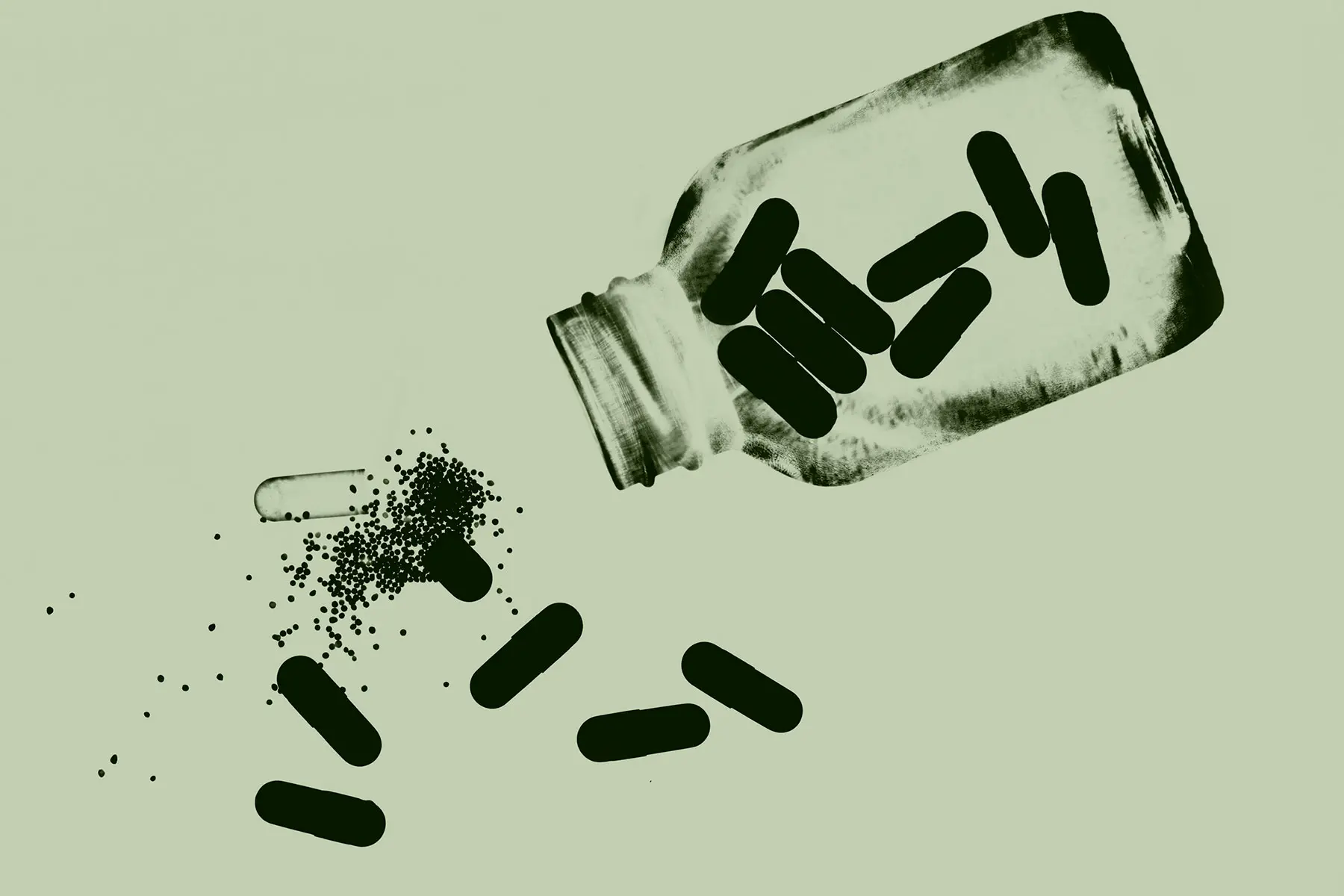 AW554 Backlit photo of pill bottle spilling out collagen capsules, green light.  Header