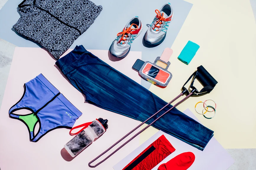 Array of workout gear on colorful background. AW073