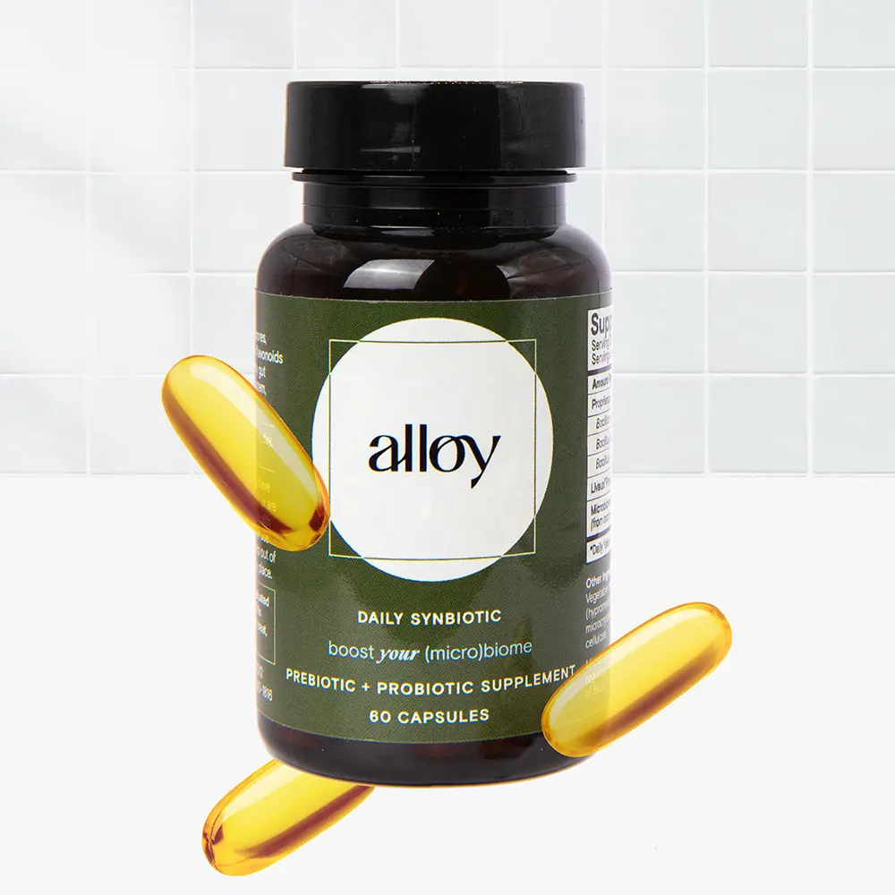 Alloy Synbiotic with pills on outside of bottle