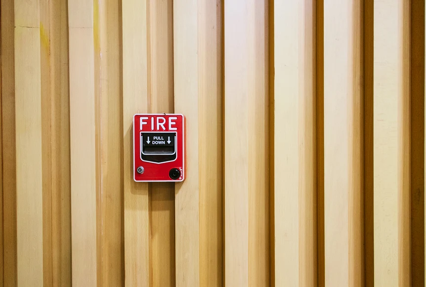 Fire alarm on outdoor wall. AW101