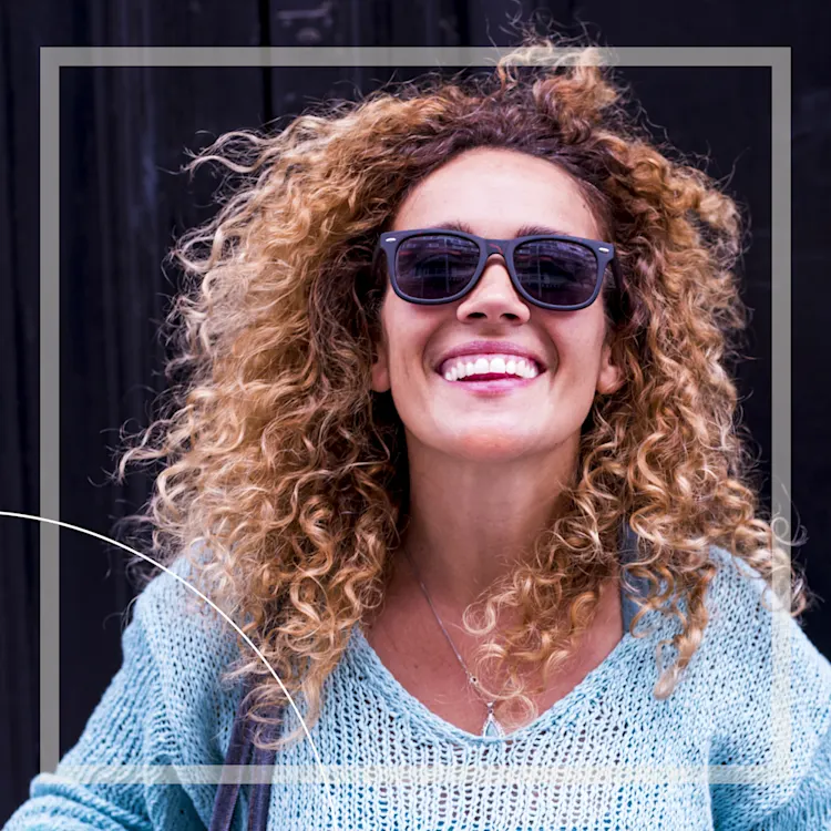 Woman Smiling with sunglasses