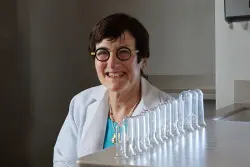 Headshot of Dr. Jane Minkin in lab coat (thumbnail)