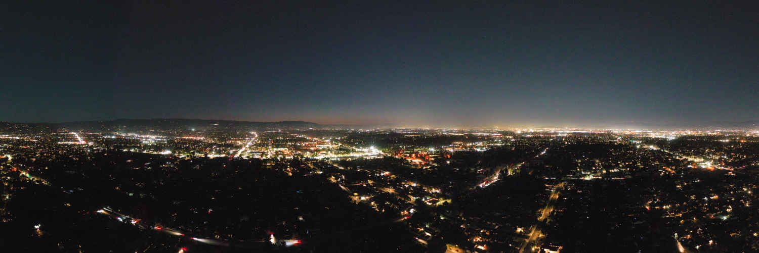 An aerial view of a city at night.