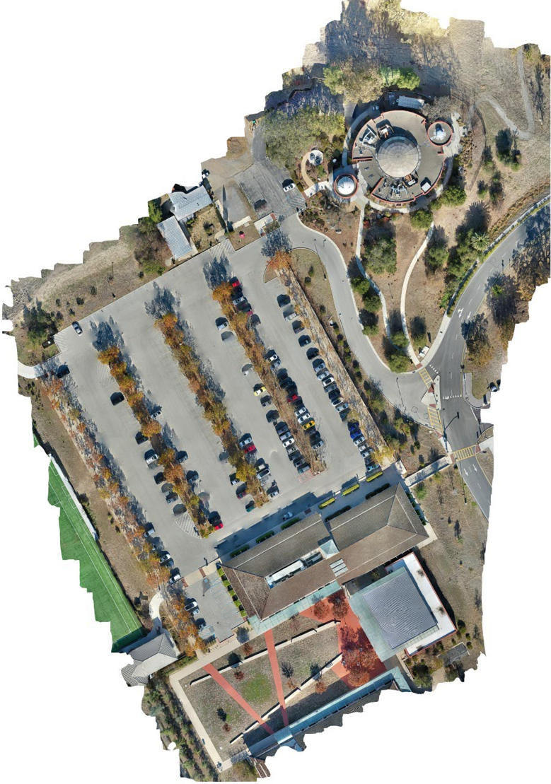 An aerial view of a parking lot.