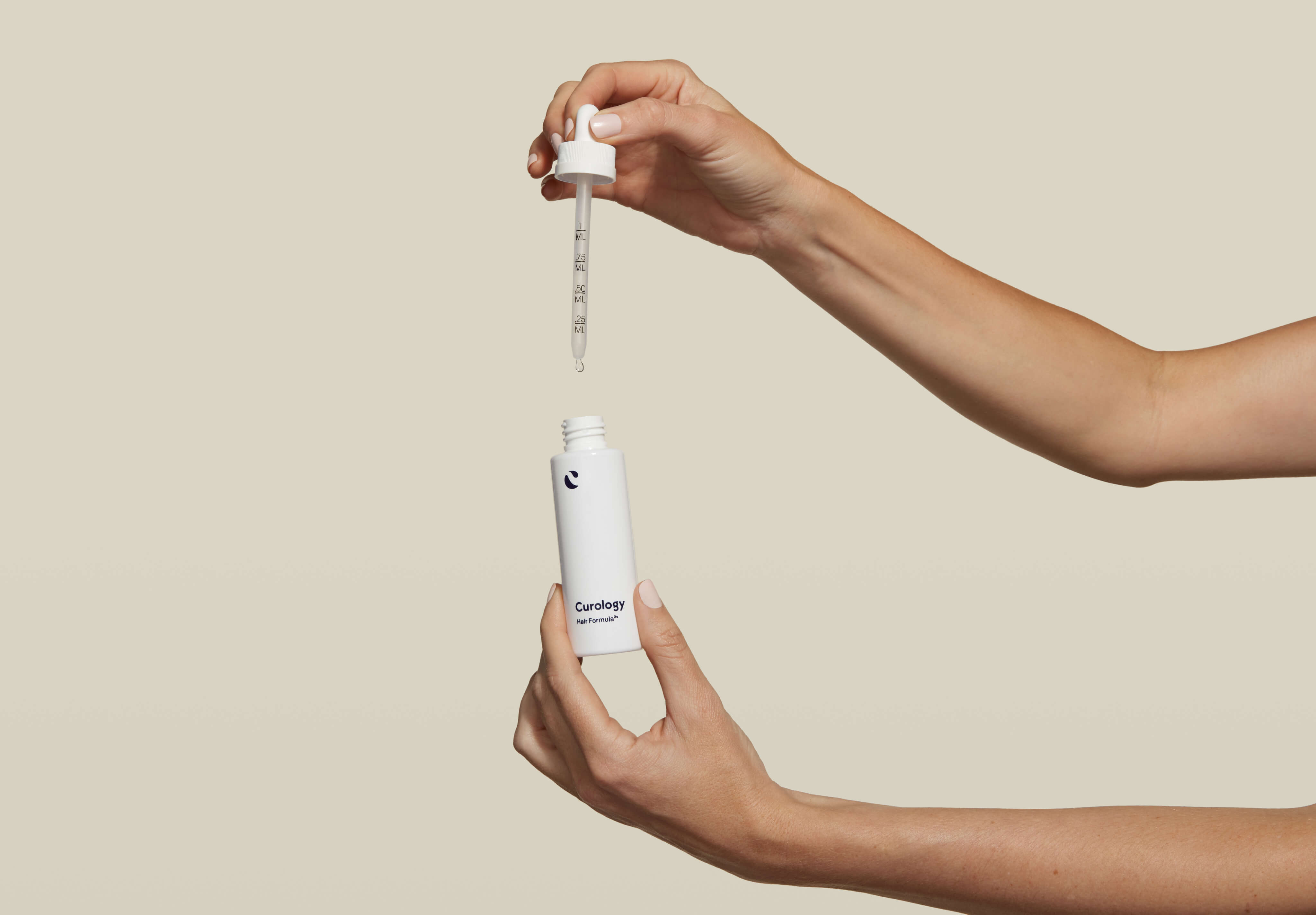 Female hand with dropper 