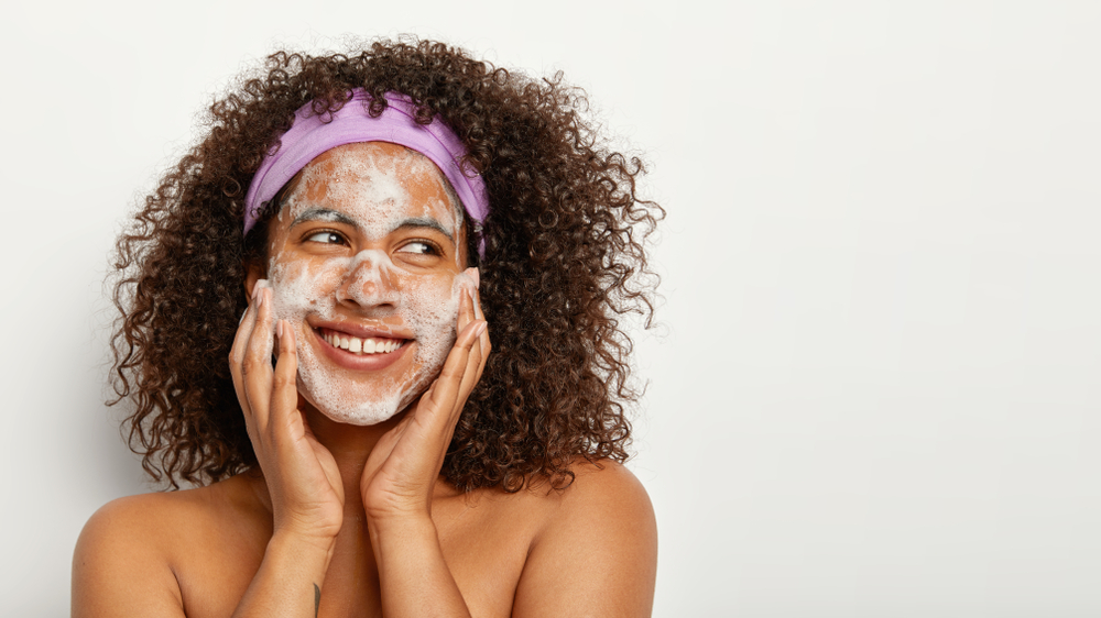 woman applying face cream