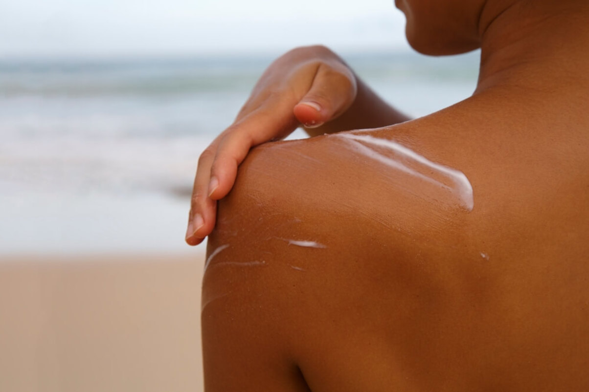 Close up of Woman Applying Sunscreen
