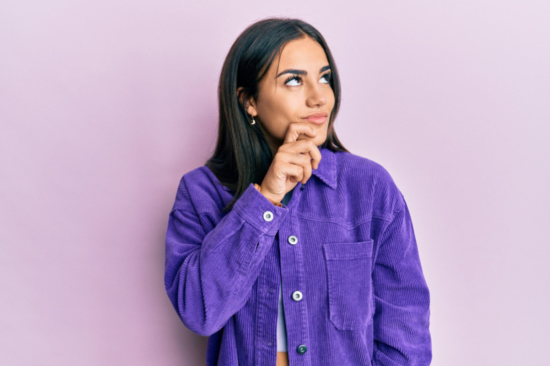 young woman wearing purple
