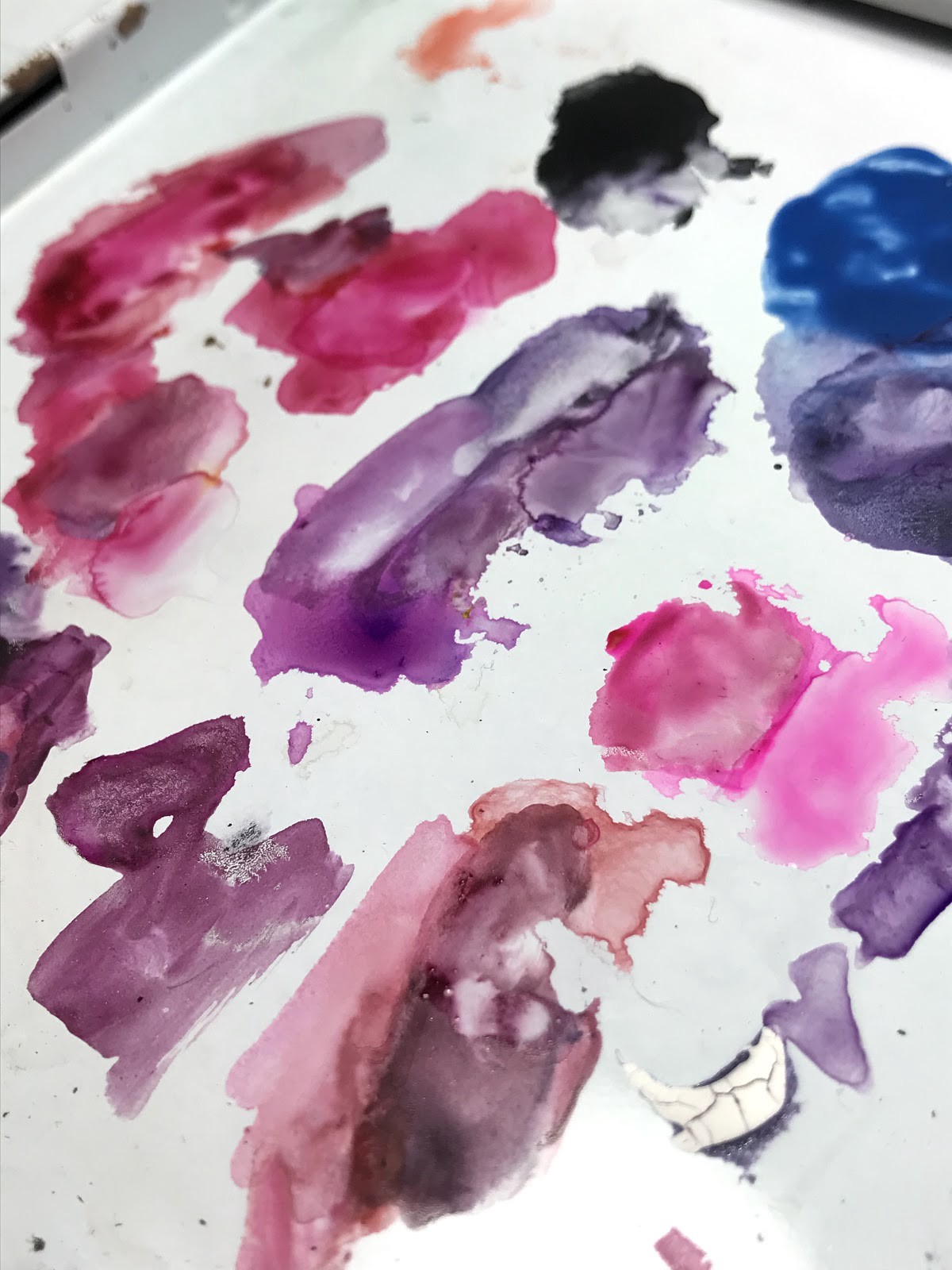 Closeup of different colors painted on canvas