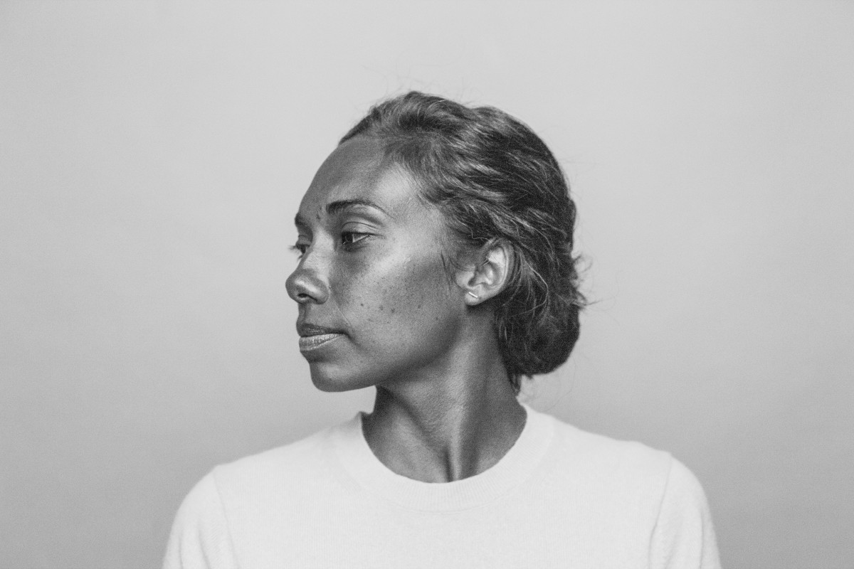 Black and white image of woman looking left