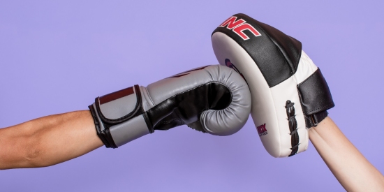 Boxing gloves with purple background